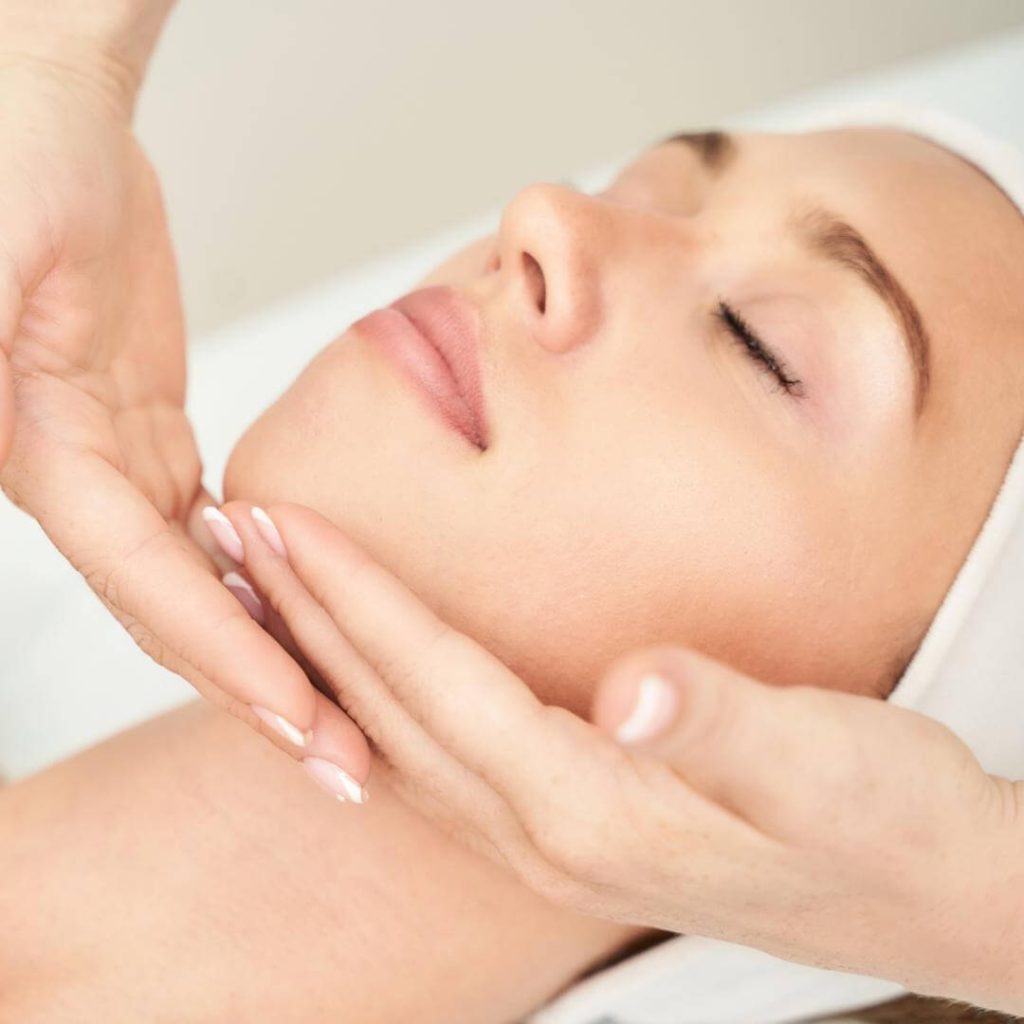 Woman receives a facial.