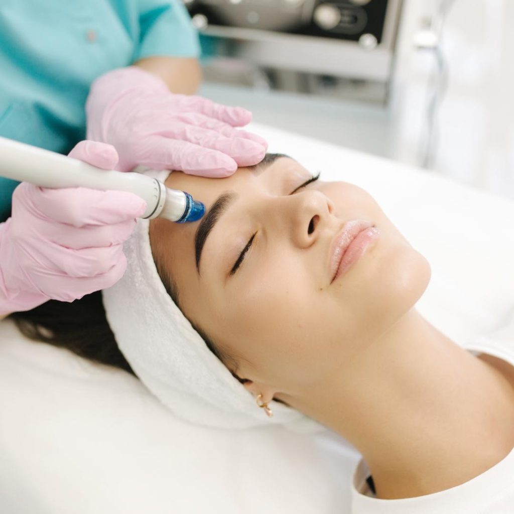 Woman enjoying a Hydrafacial.