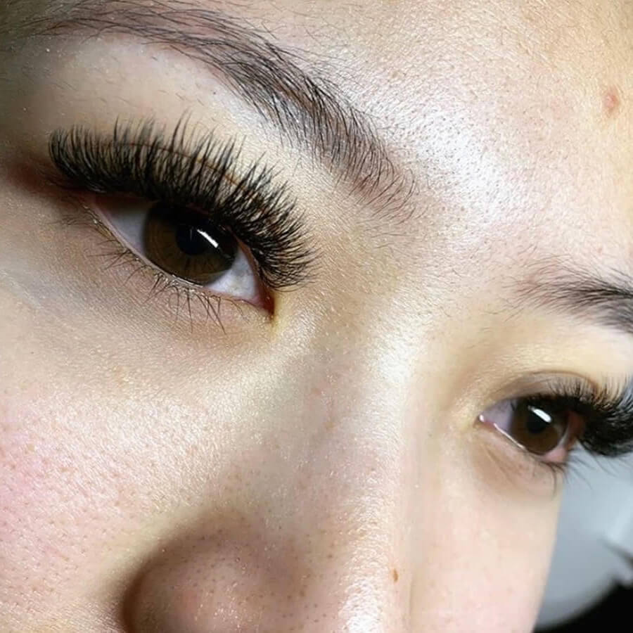 Up-close of client's volume lash extensions.